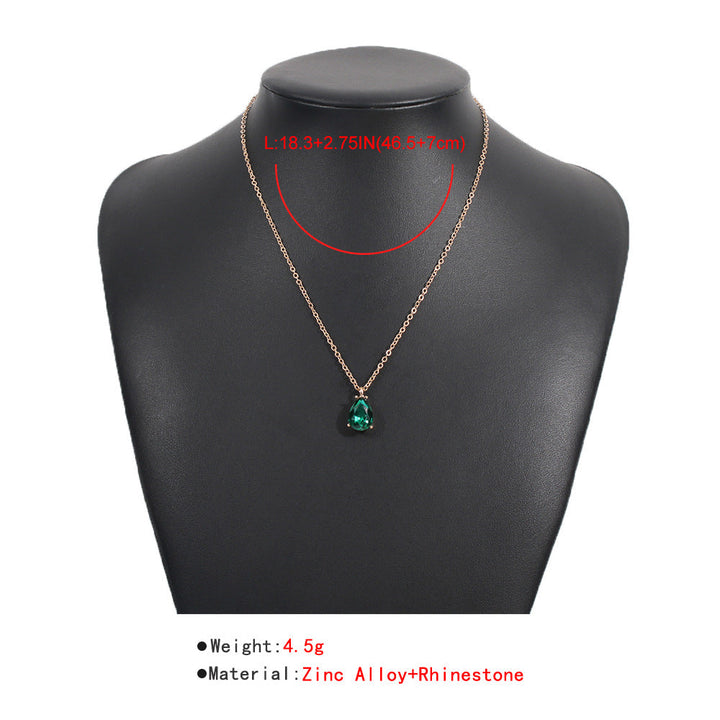 Goldene Halskette mit grünem Anhänger, Zinklegierung, Schmuck für Damen, elegantes Design.