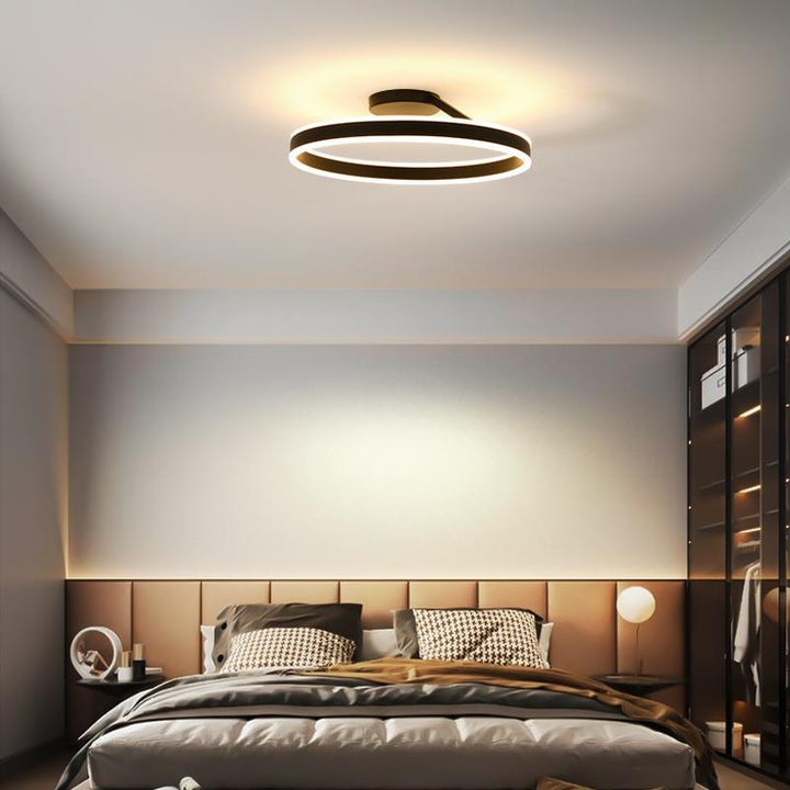 Moderne LED-Deckenleuchte im Schlafzimmer, schwarz, energiesparend, stilvolles Design.