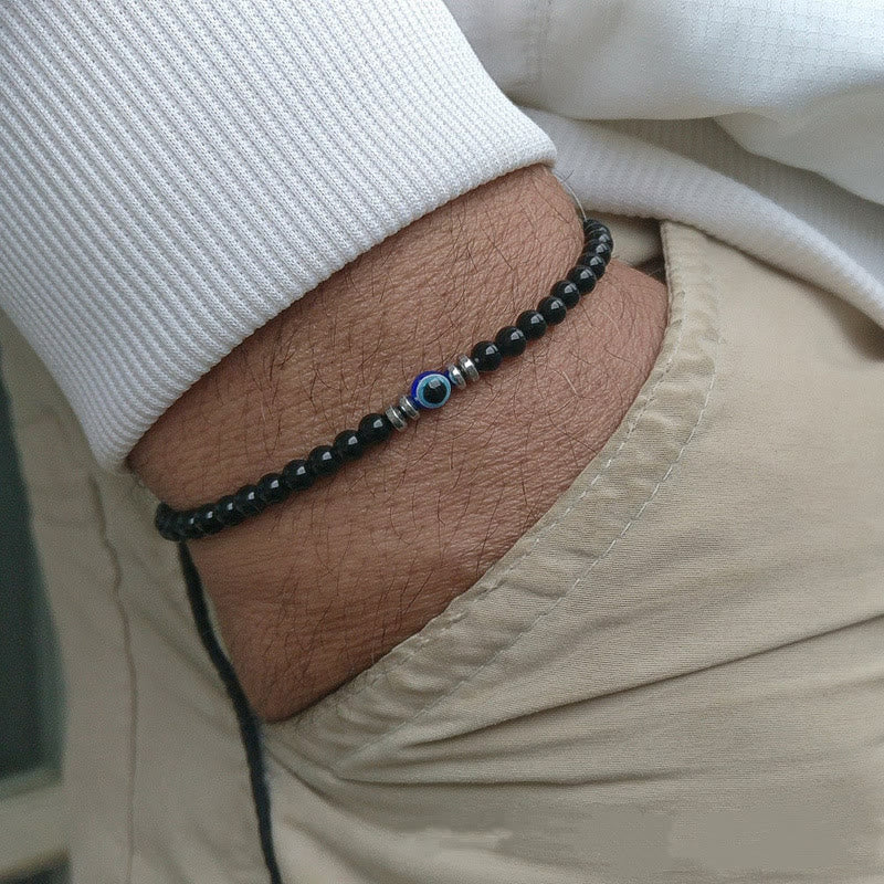 Schwarzes Perlenarmband mit blauem Auge, Herrenmode, handgefertigt, lässiger Schmuck.