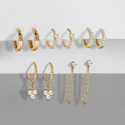 5-teiliges Set goldene Ohrringe mit Herzanhänger und Zirkonia, Damen Schmuck, Retro-Stil.