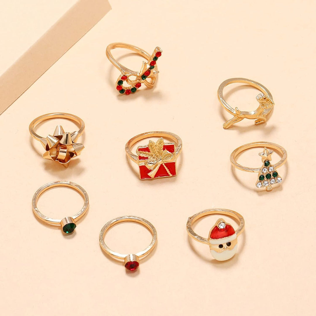 Weihnachtliche Ringe Set, goldfarben, mit Weihnachtsbaum, Rentier, Geschenk, Santa-Motiv.