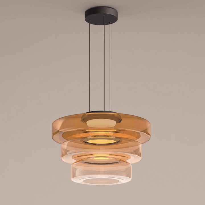 Moderne Pendelleuchte aus Glas, dreistufig, in Bernsteinfarbe, für Wohnzimmerbeleuchtung.