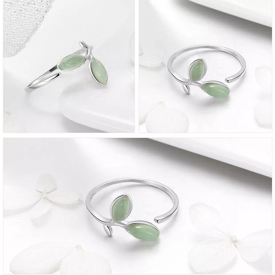 Silberring mit grünen Edelsteinblättern, elegantes Design, Damen-Schmuck, Geschenkidee.