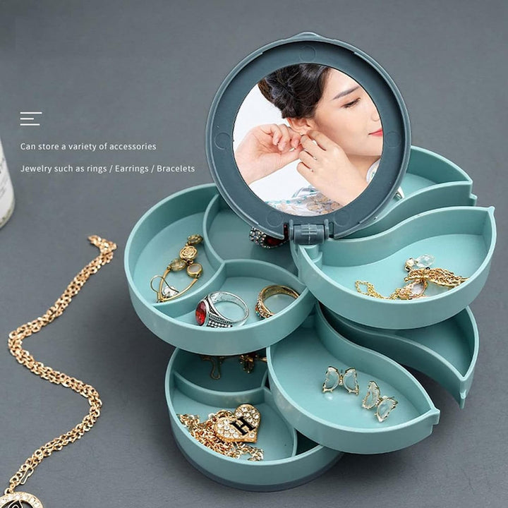 Blauer Schmuck-Organizer mit Spiegel, ideal für Ringe, Ohrringe, Armbänder, platzsparend.