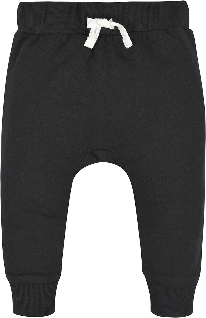 Schwarze Baby-Jogginghose aus Baumwolle mit weißem Kordelzug, bequem und modisch.