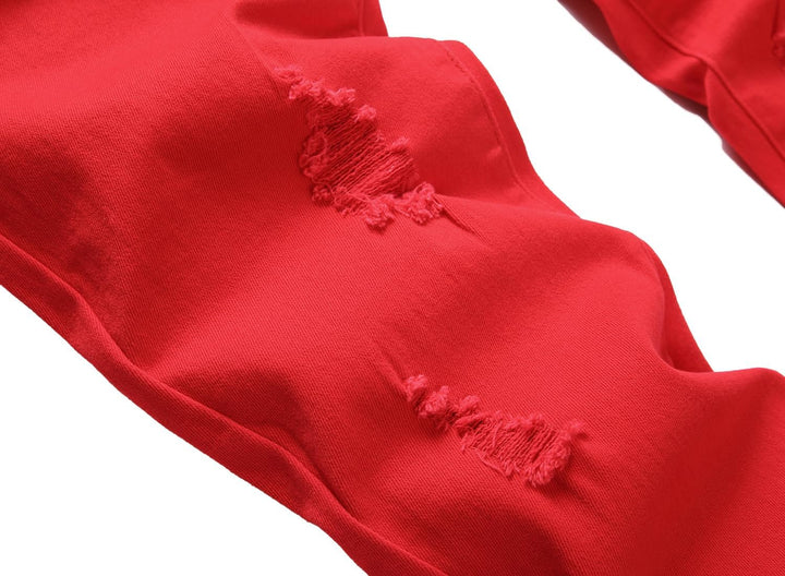 Rote zerrissene Jeans, Baumwolle, modisch, Nahaufnahme, Textur, Streetwear, Damenmode.