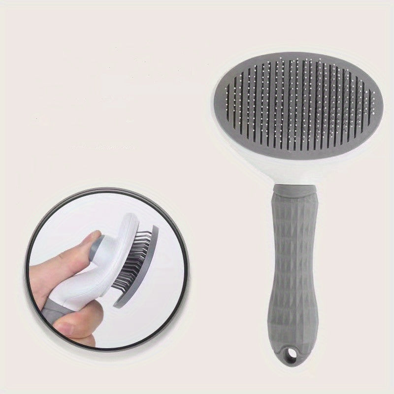Graue Haustierbürste mit ergonomischem Griff, ideal für Hunde- und Katzenpflege.