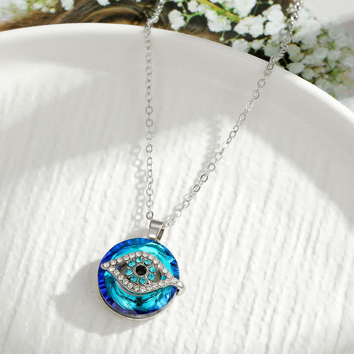 Silberkette mit blauem Auge-Anhänger, Kristallverzierung, modisches Schmuckstück.