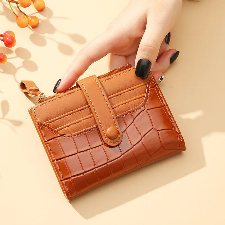 Braune Leder-Geldbörse mit Krokodilprägung, Damenhandtasche, modisches Accessoire.