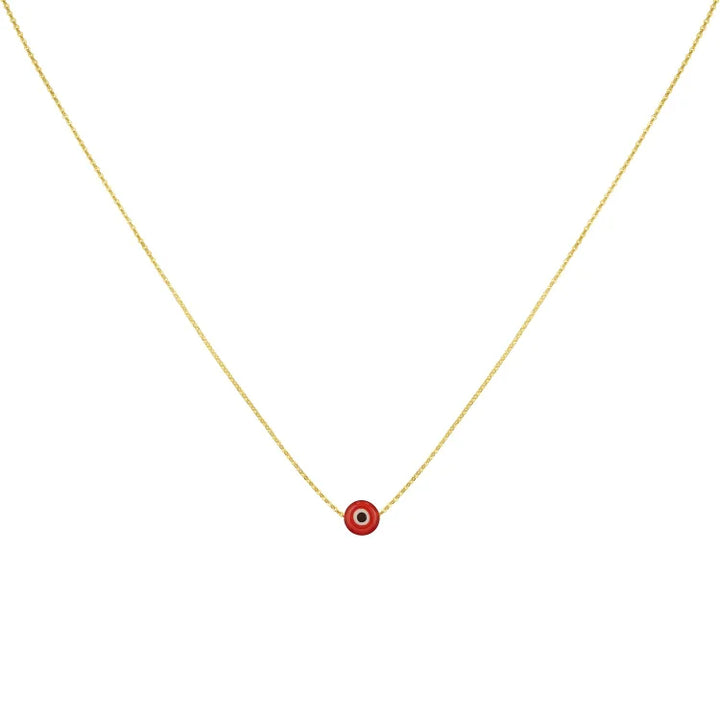 Goldene Halskette mit rotem Anhänger, minimalistisches Design, eleganter Schmuck für Damen.