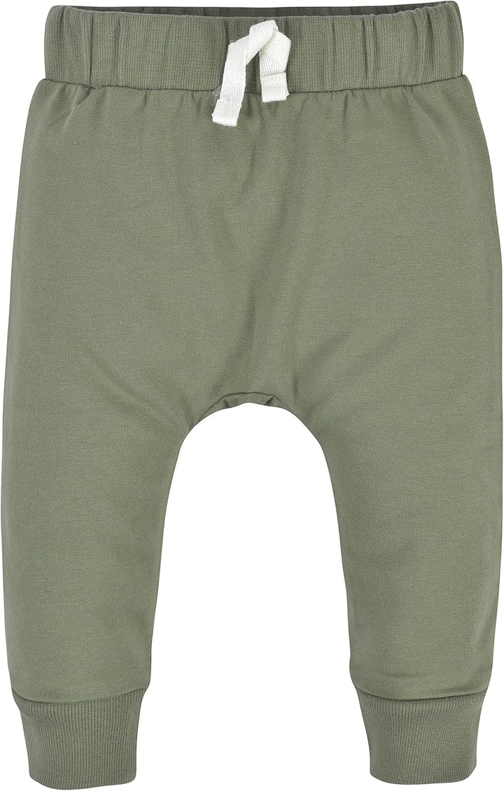 Grüne Babyhose aus Baumwolle mit Kordelzug, bequem und weich, ideal für Neugeborene.