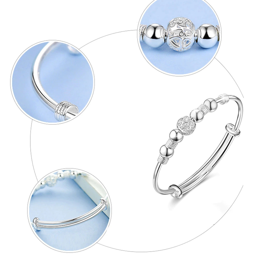 Silberarmband mit Perlen, filigranes Design, verstellbar, Schmuck für Damen, elegant und modern.