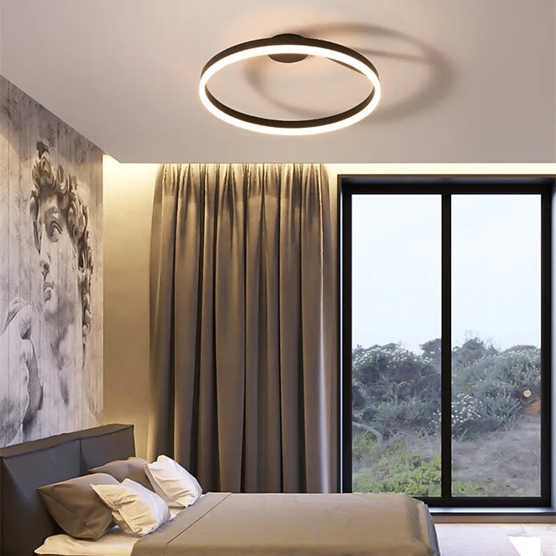 Moderne LED-Deckenleuchte im Schlafzimmer, schwarz, energiesparend, stilvolles Design.