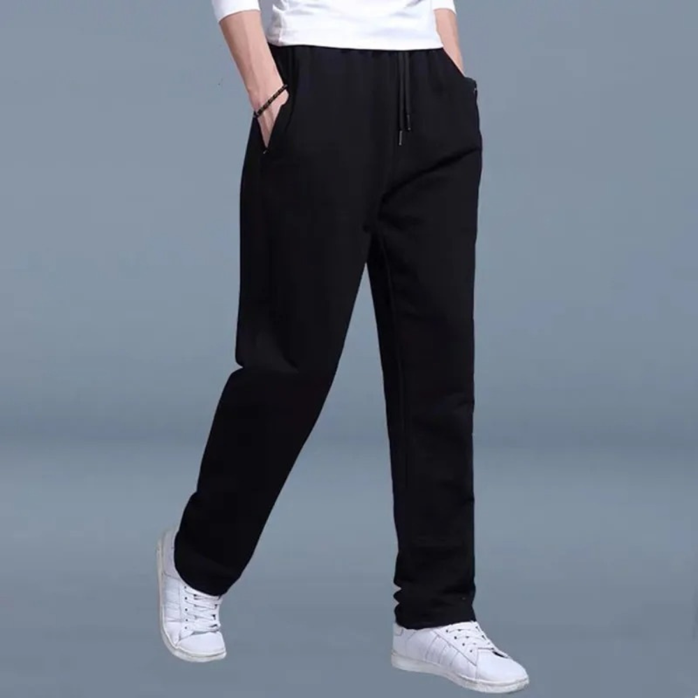 Schwarze Herren-Jogginghose, bequem, Baumwolle, sportlich, mit Taschen, ideal für Freizeit.