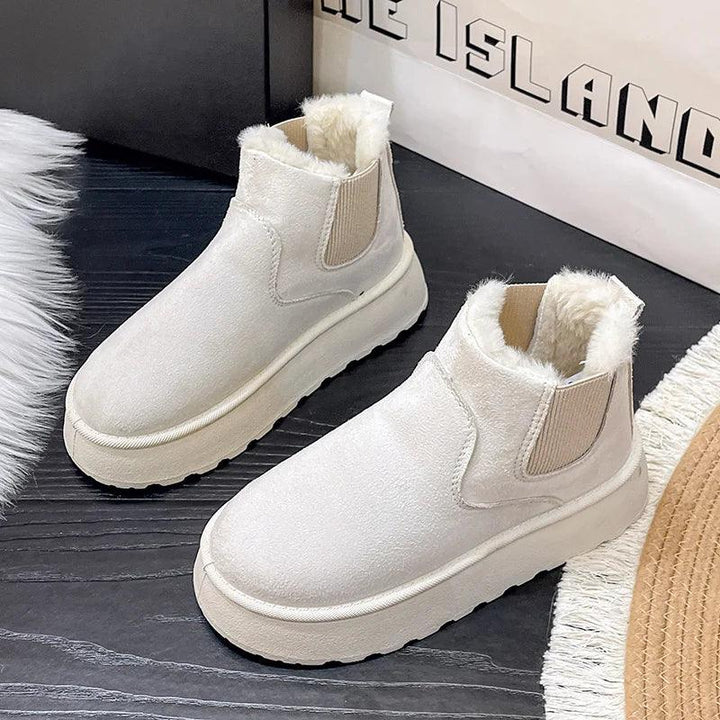 Weiße Damen-Stiefeletten mit Fellfutter, rutschfeste Sohle, modisch und bequem.