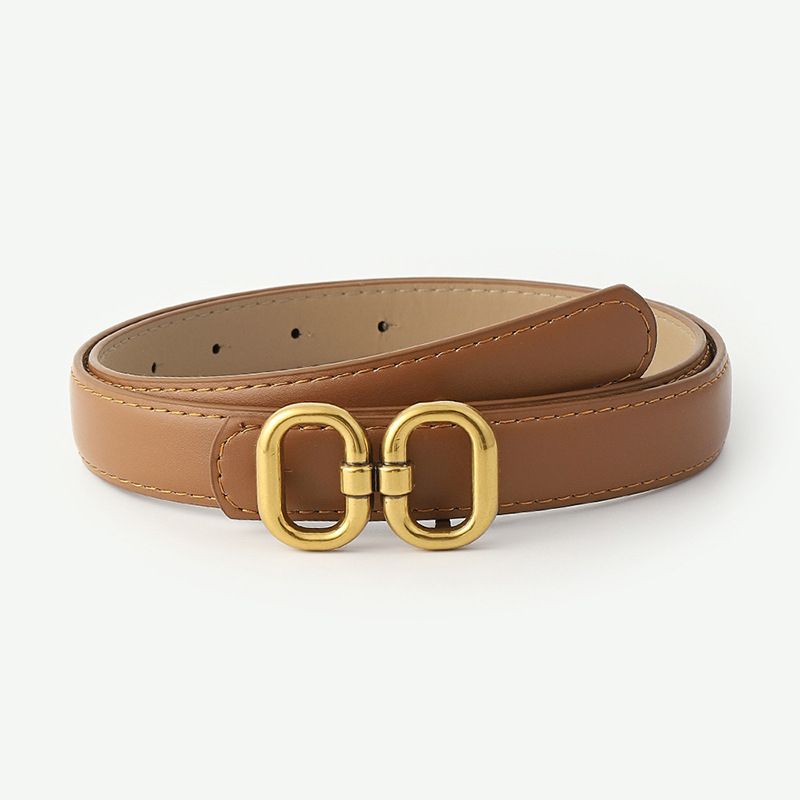 Brauner Ledergürtel mit goldener Schnalle, modisches Accessoire, Damenmode.