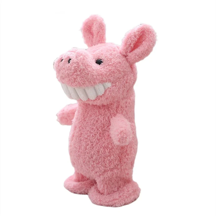 Plüschspielzeug rosa Schwein mit großen Zähnen, kuscheliges Stofftier für Kinder.