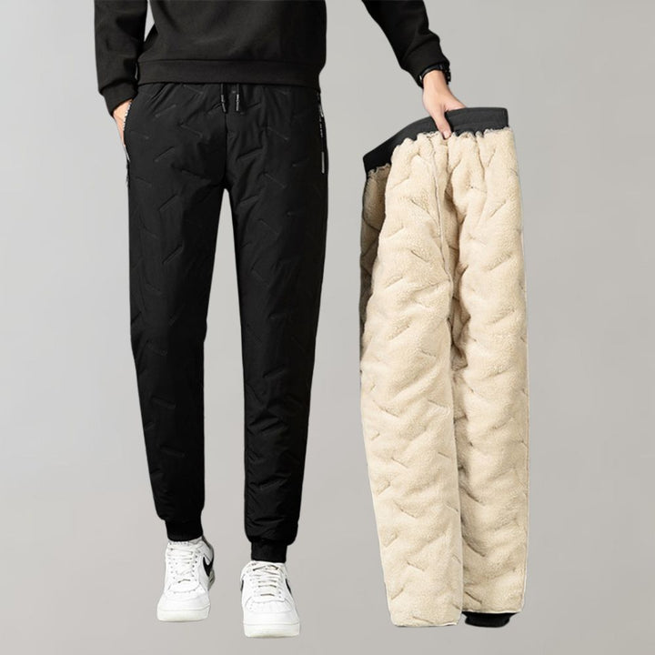 Schwarze Herren-Jogginghose mit beigem Futter, warm, bequem, Winterkleidung.