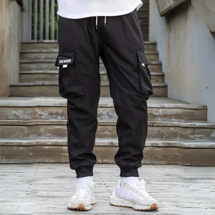 Schwarze Cargohose für Herren, lässig, mit Taschen, Baumwolle, Streetwear, Mode.