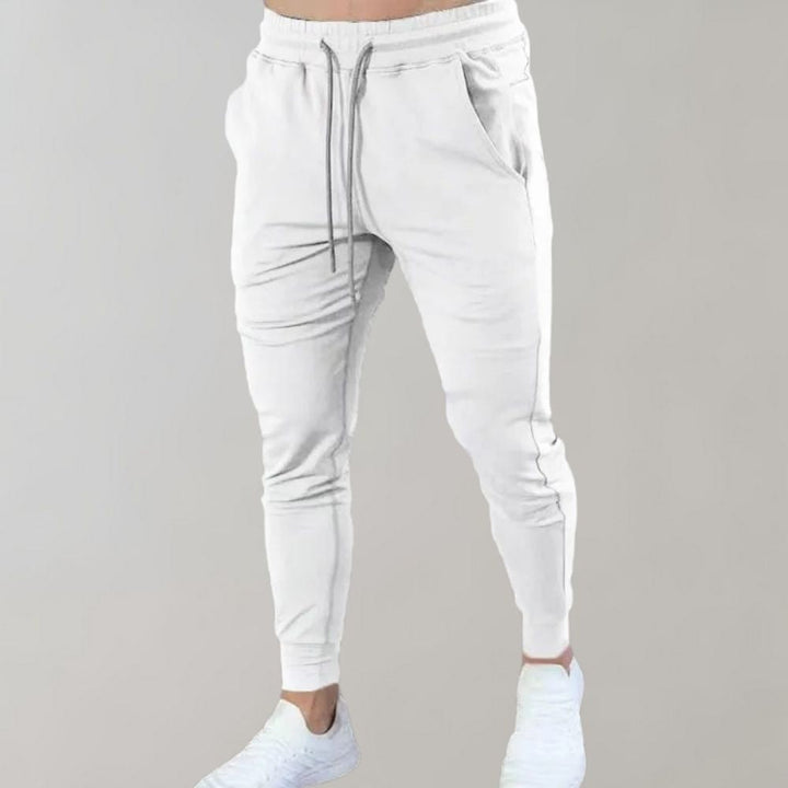 Weiße Jogginghose für Herren, Baumwolle, elastischer Bund, sportlich, bequem.