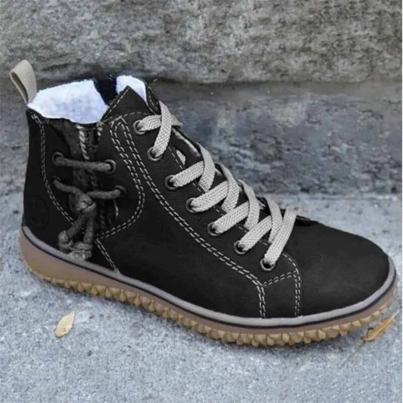 Schwarzer Damen-Sneaker, Leder, rutschfeste Sohle, bequeme Passform, modisch, urban.
