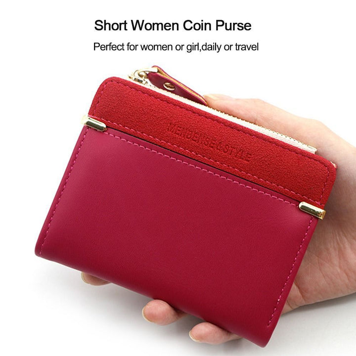 Rote Damen-Geldbörse aus Leder, kompakt, ideal für Reisen und Alltag, mit Reißverschluss.