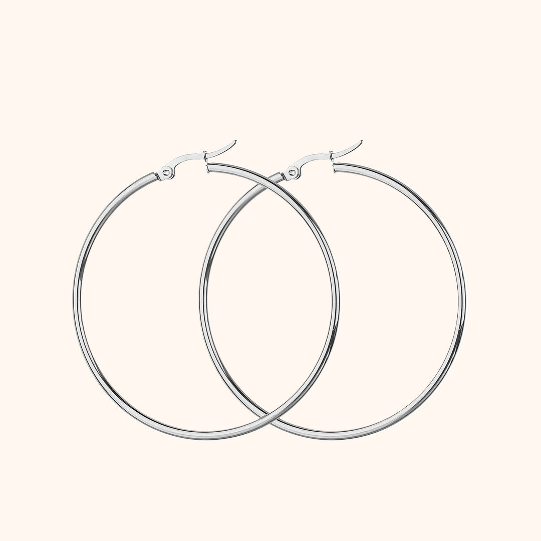 Silberne Creolen Ohrringe, Edelstahl, minimalistisches Design, modischer Schmuck für Damen.