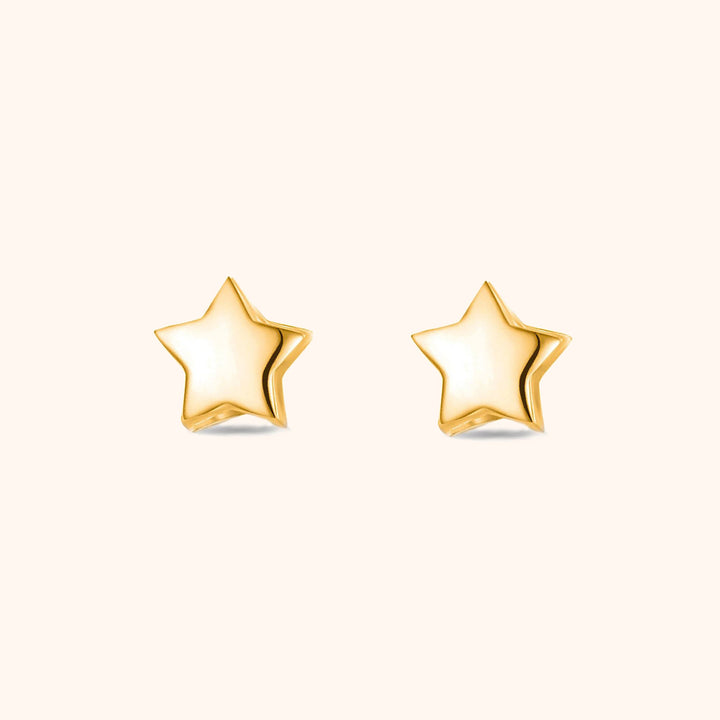 Goldene Stern-Ohrringe, glänzend, modisch, Schmuck für Damen, elegantes Accessoire.