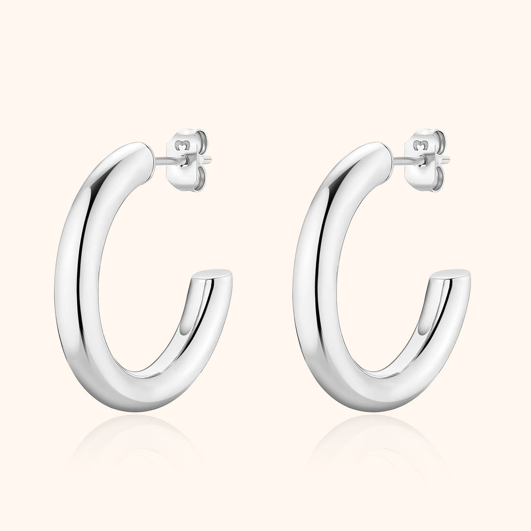 Silberne Creolen Ohrringe, glänzend, Edelstahl, modisch, zeitloses Design, Schmuck für Damen.