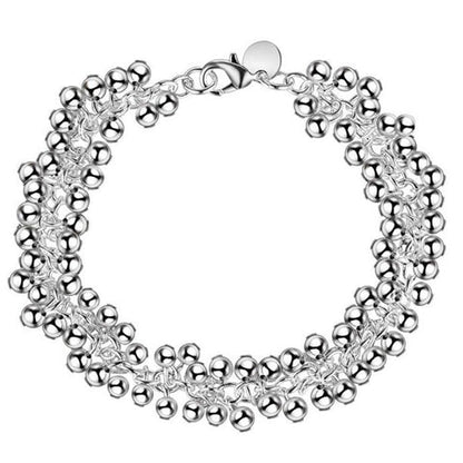 Silbernes Perlenarmband, mehrreihig, Damen-Schmuck, elegantes Design, modisches Accessoire.