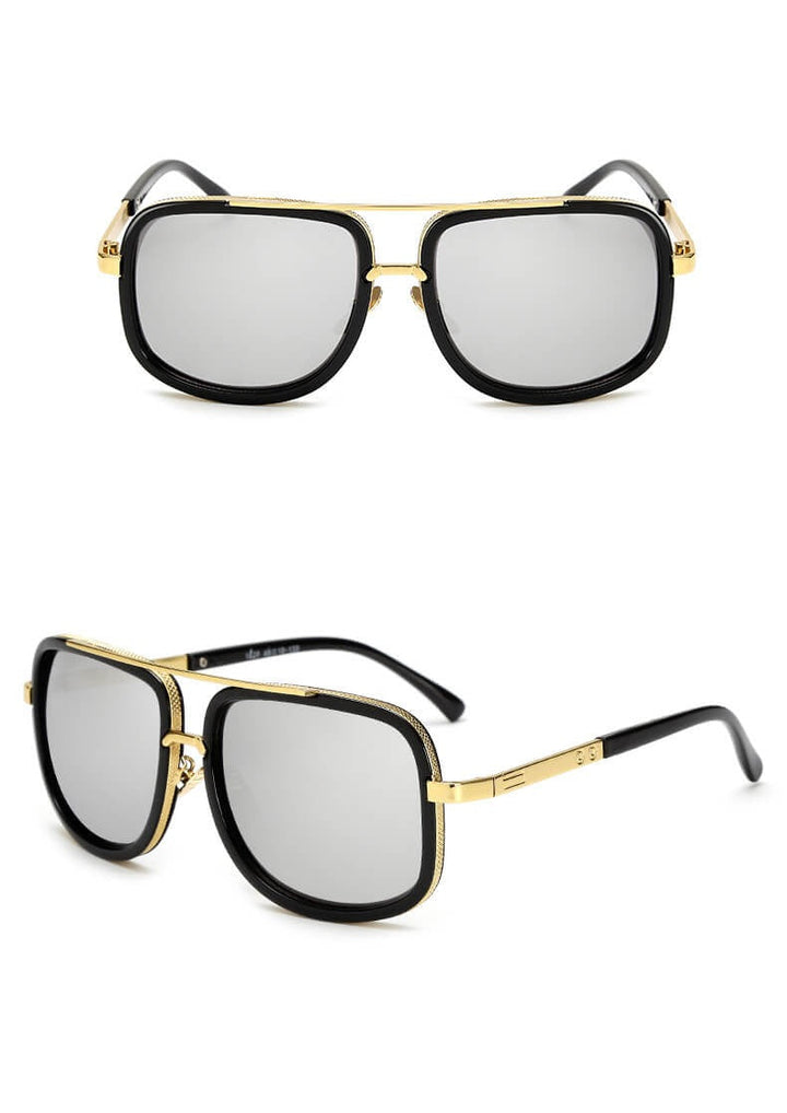 Schwarze Sonnenbrille mit goldenen Akzenten, rechteckige Gläser, modisches Accessoire.