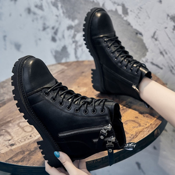 Schwarze Lederstiefel mit Reißverschluss, robuste Sohle, modisch, Damenstiefel.