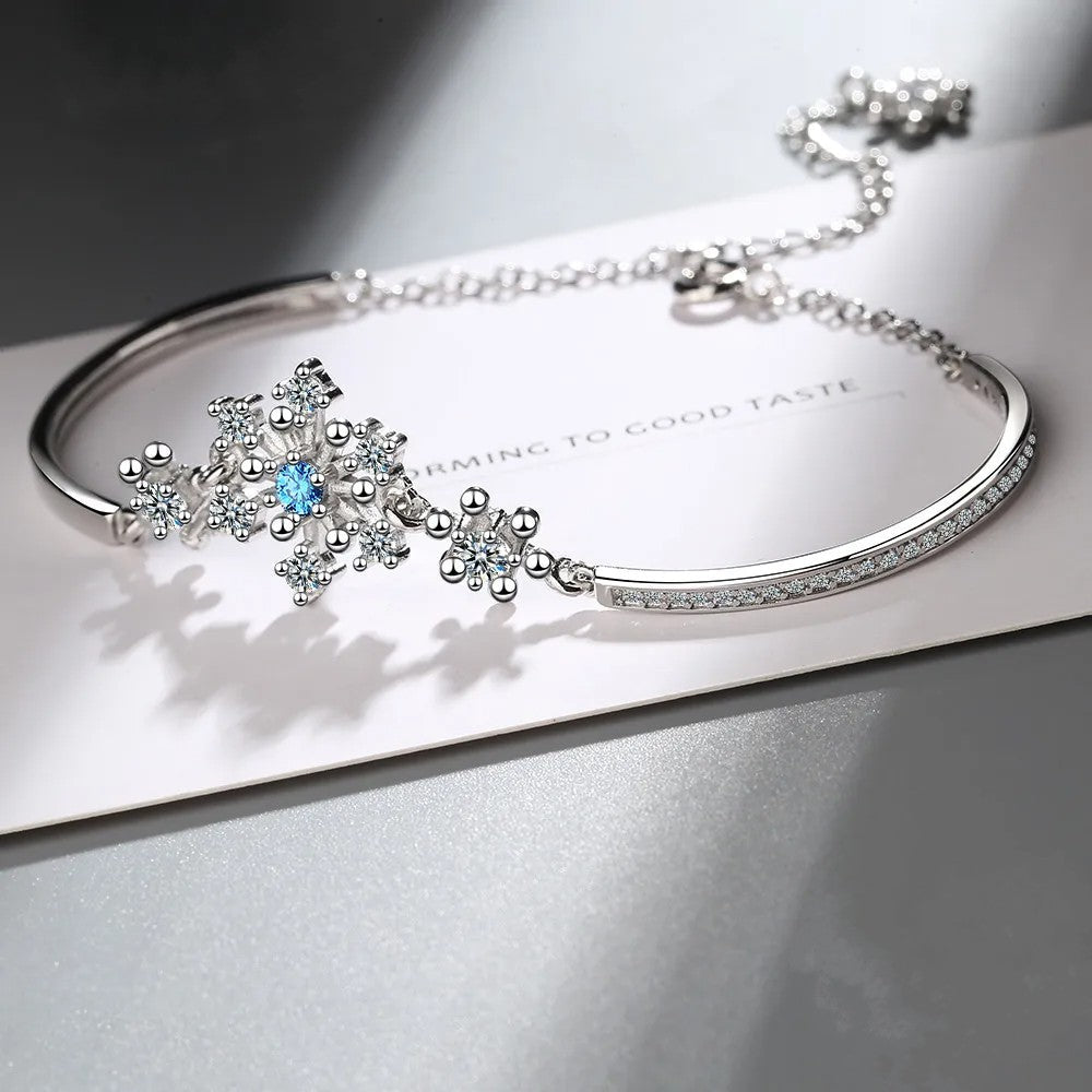 Silbernes Armband mit Schneeflocken-Anhänger, blauer Kristall, Damen-Schmuck, elegant, modisch.