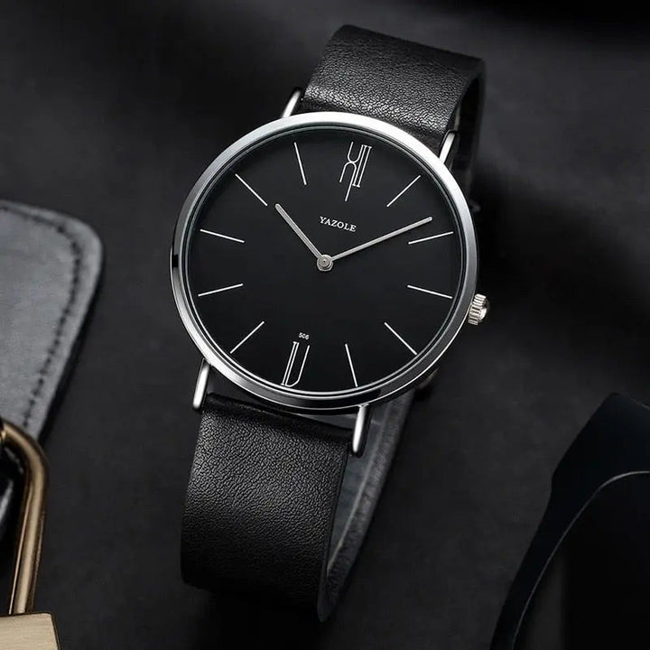 Schwarze Yazole Armbanduhr mit Lederarmband, minimalistisches Design, elegantes Zifferblatt.