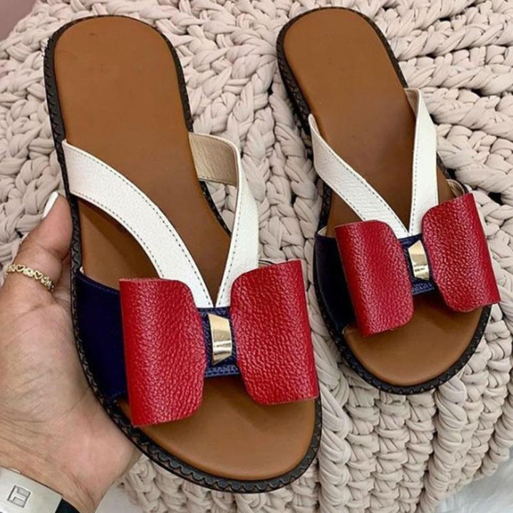 Damen Sandalen mit roter Schleife, weißem Riemen, brauner Sohle, modisch, bequem.