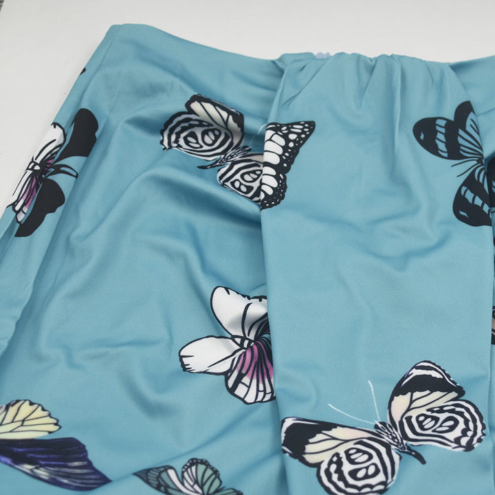 Hellblauer Rock mit Schmetterlingsmuster, Damenmode, Sommerkleidung, Polyesterstoff.