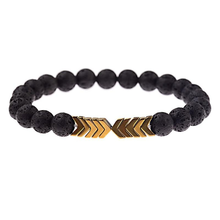 Schwarzes Lavastein-Armband mit goldenen Pfeil-Details, elastisch, Unisex-Schmuck.