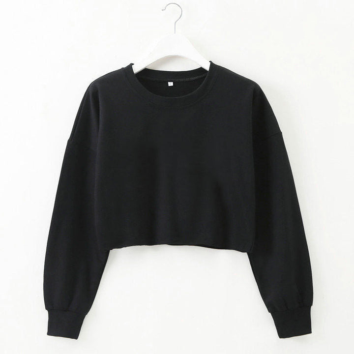 Schwarzes Damen-Cropped-Sweatshirt, langärmelig, Baumwolle, lässig, modisch, auf Bügel.