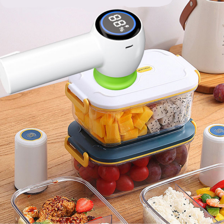 Vakuumiergerät mit Frischhalteboxen, weiß, digital, für Obst und Gemüse, Küche, Lebensmittelaufbewahrung.