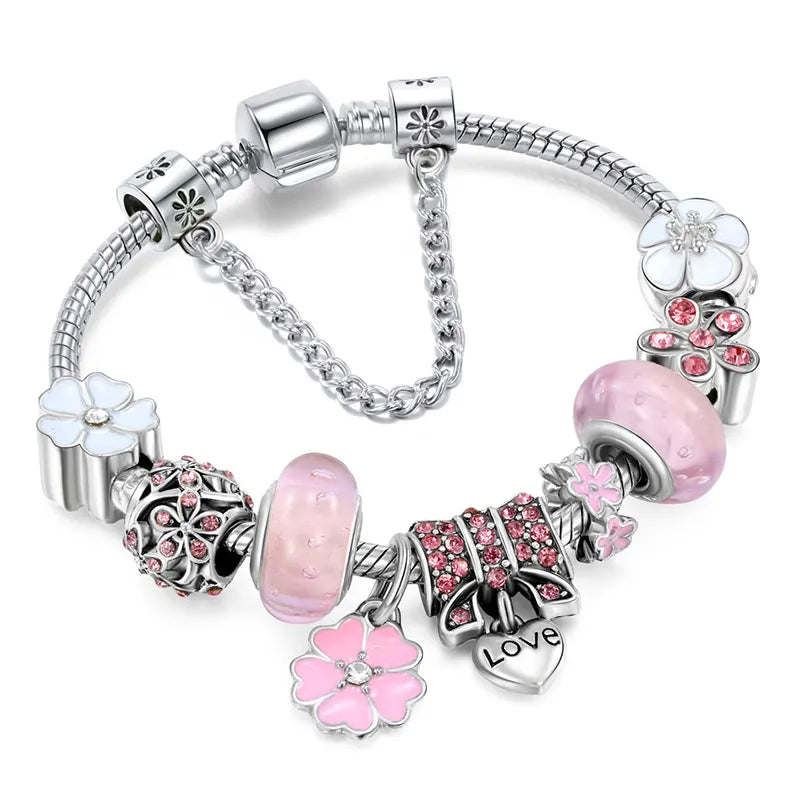 Silberarmband mit rosa und weißen Blumenanhängern, Herzanhänger, Schmuck für Damen.
