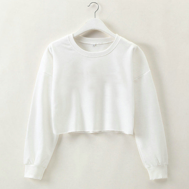 Weißes Damen-Crop-Top aus Baumwolle, Langarm, Rundhalsausschnitt, modisch, bequem.