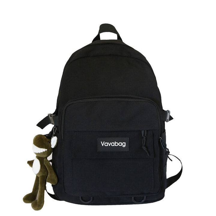 Schwarzer Rucksack mit Plüschanhänger, Vavabag-Logo, vielseitig, modisch, robust.
