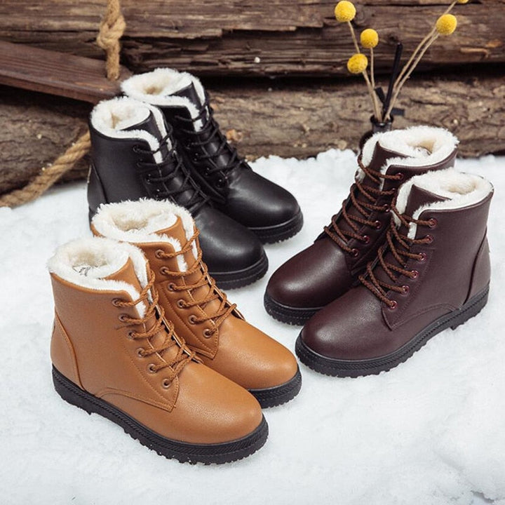 Damen Winterstiefel, gefüttert, Lederoptik, braun und schwarz, rutschfeste Sohle, Schnee.