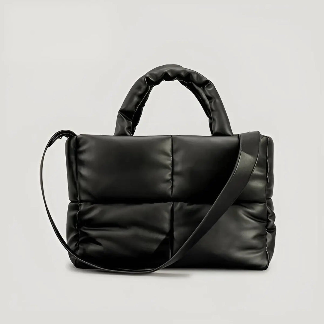 Schwarze gesteppte Handtasche aus Leder mit Schulterriemen, modisch, elegant, Damenaccessoire.