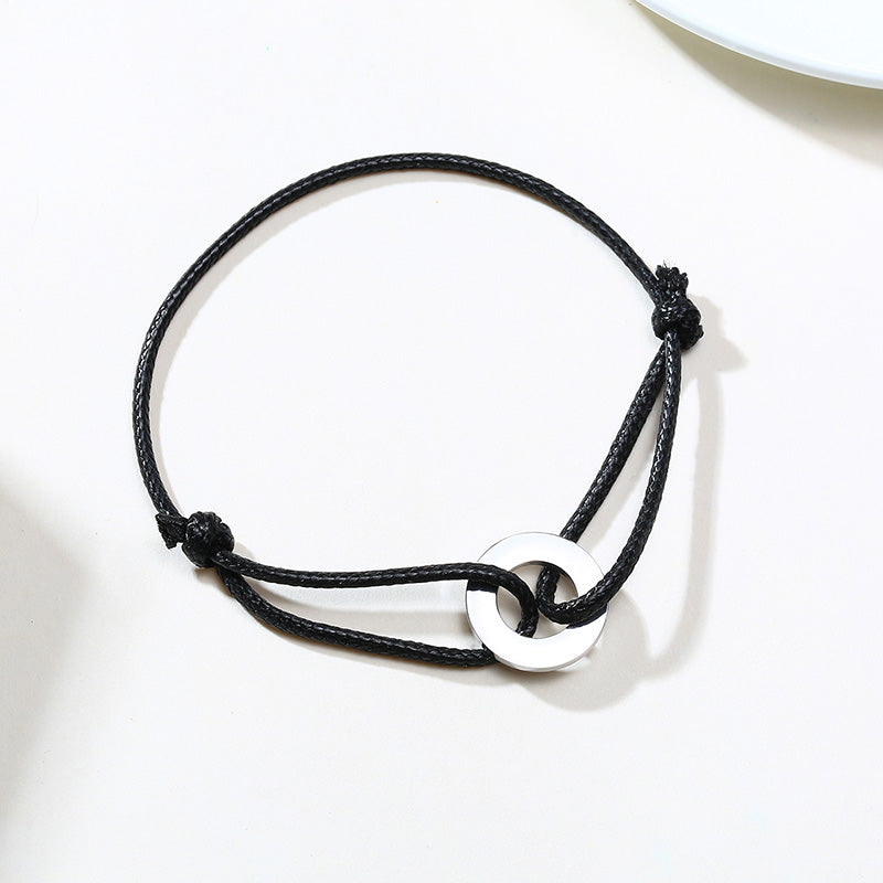 Schwarzes verstellbares Karma-Armband mit silbernem Kreisanhänger, spiritueller Yoga-Schmuck.