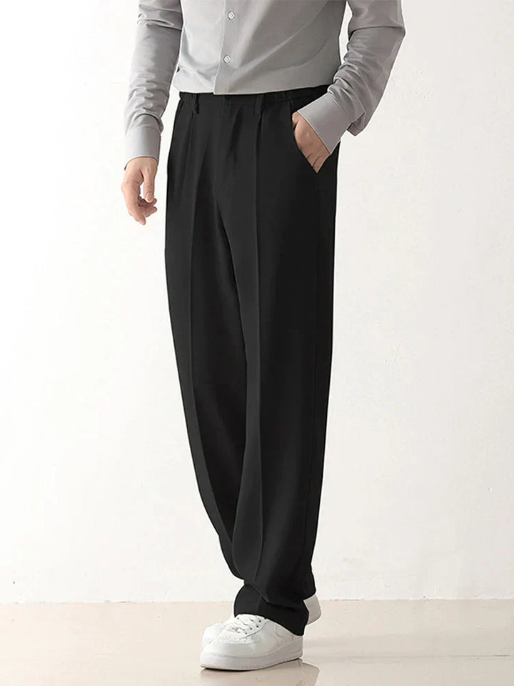 Schwarze Herrenhose, locker geschnitten, Polyester, modisch, ideal für Frühling und Herbst.