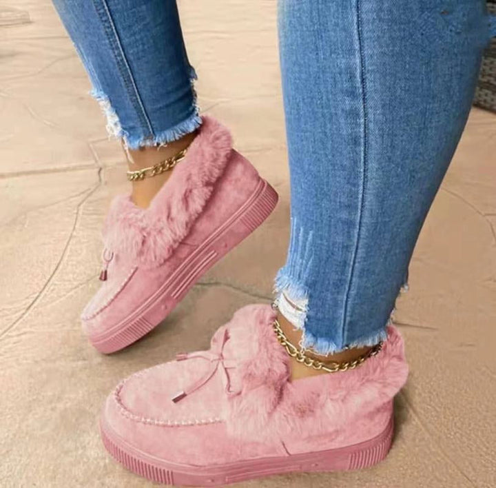 Damen-Winterschuhe rosa, flauschig, bequem, modisch, Jeans, goldene Fußkettchen.
