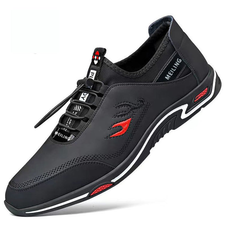 Schwarzer Herren-Sneaker, stilvoll, bequem, mit rotem Akzent, ideal für Freizeitkleidung.