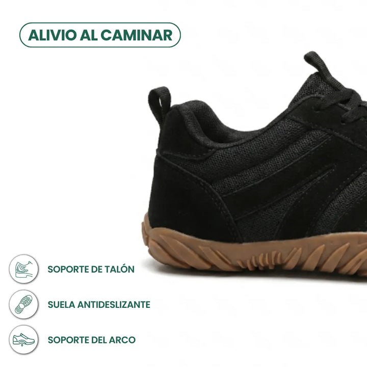 Černá bota z boku, detail paty a světle hnědé podrážky s výčtem funkcí: opora paty, protiskluzová podrážka, opora klenby. 22