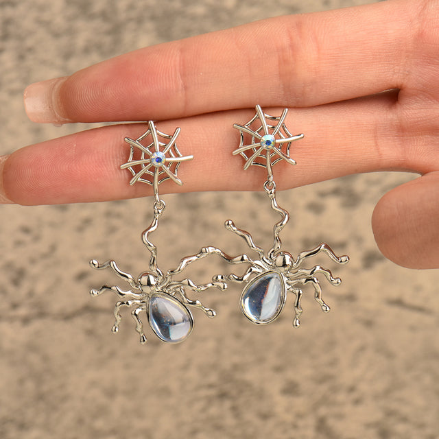 Silberne Spinnen-Ohrringe mit blauen Steinen, Damen-Schmuck, einzigartiges Design.